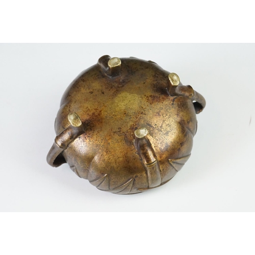 146 - Chinese bronze koro and cover with raised leaf decoration, on four feet