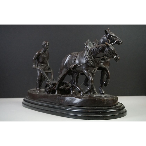 156 - Bronze Figure Group of a Farmer ploughing with Two Horses on marble socle base, 40cm long