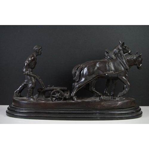 156 - Bronze Figure Group of a Farmer ploughing with Two Horses on marble socle base, 40cm long
