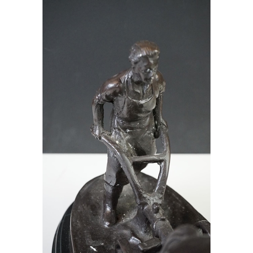 156 - Bronze Figure Group of a Farmer ploughing with Two Horses on marble socle base, 40cm long