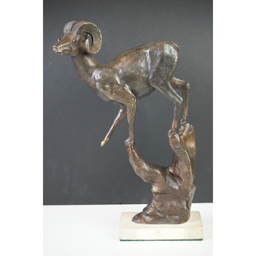 169 - Bronze Mouflon standing on a Rocky Promontory, mounted on a stone base, signed ' Teran 1999 ' for Ju... 