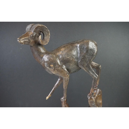 169 - Bronze Mouflon standing on a Rocky Promontory, mounted on a stone base, signed ' Teran 1999 ' for Ju... 