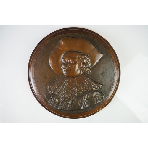 170 - Bronze Circular Plaque depicting the Laughing Cavalier in relief, 22cm diameter mounted on a wooden ... 