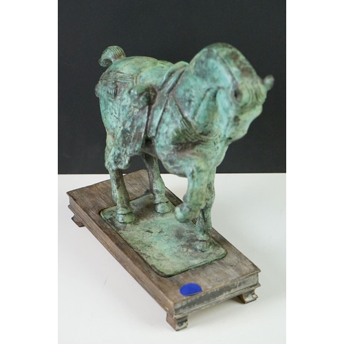 181 - Verdigris Bronze  Figure of a Chinese Tang Horse fitted onto a wooden plinth base, 26cm high togethe... 
