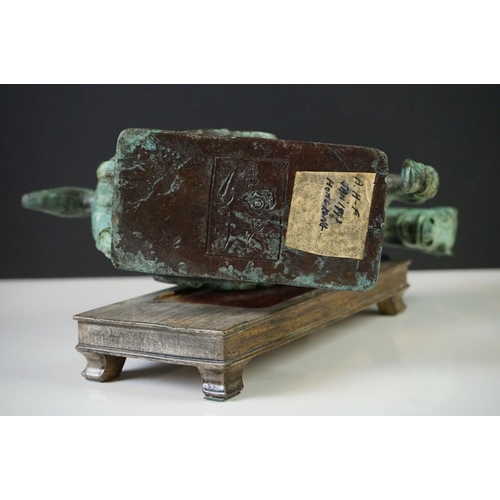 181 - Verdigris Bronze  Figure of a Chinese Tang Horse fitted onto a wooden plinth base, 26cm high togethe... 