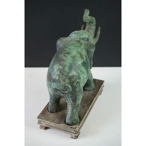 181 - Verdigris Bronze  Figure of a Chinese Tang Horse fitted onto a wooden plinth base, 26cm high togethe... 