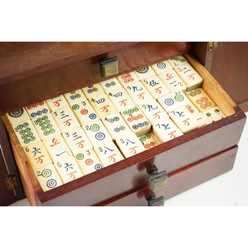 184 - Mah-jongg - Chinese Bone and Bamboo Mah-jongg Tiles and contained within a Hardwood Cabinet with two... 