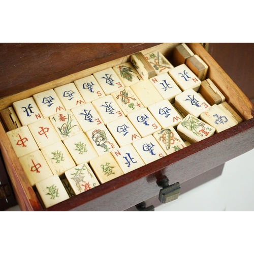 184 - Mah-jongg - Chinese Bone and Bamboo Mah-jongg Tiles and contained within a Hardwood Cabinet with two... 