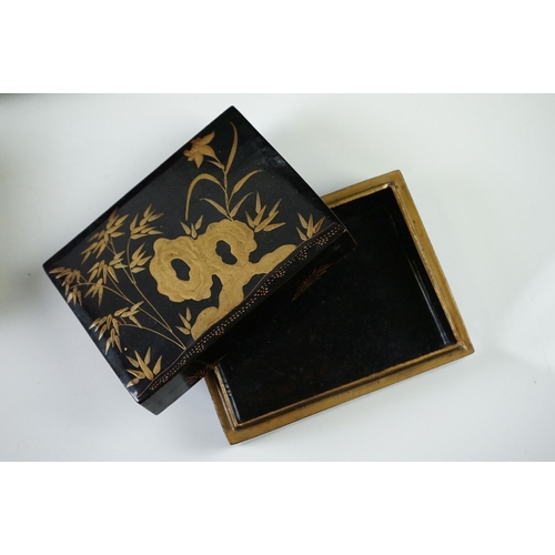 187 - Japanese Black Lacquered Jewellery or Trinket Box with chinoiserie decoration, the lift off lid open... 