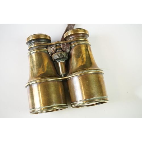 193 - A small group of collectables to include two trench art vases, trench lighter, binoculars and a matc... 