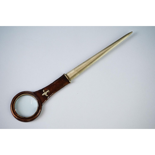 205 - Combination Paper Knife and Magnifying Glass with fleur de lys decoration, 19cm long