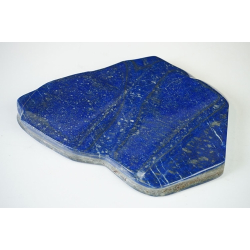 207 - A large polished Lapis lazuli stone.