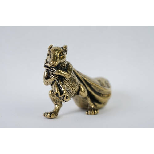 212 - An ornamental Solid brass lucky fortune rat with bag.