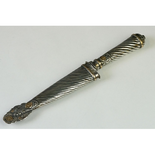219 - An Argentinian silver handled Gaucho knife complete with matching silver scabbard.
