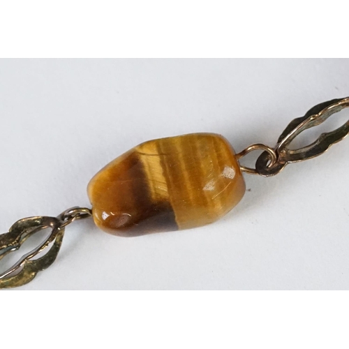 224 - 14ct & semi precious stone bracelet to include tiger's eye