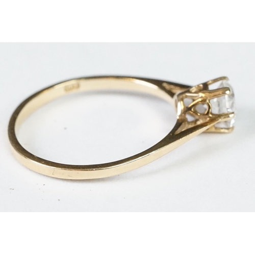 224A - A ladies hallmarked 9ct gold solitaire ring together with a ladies 18ct gold boat ring.