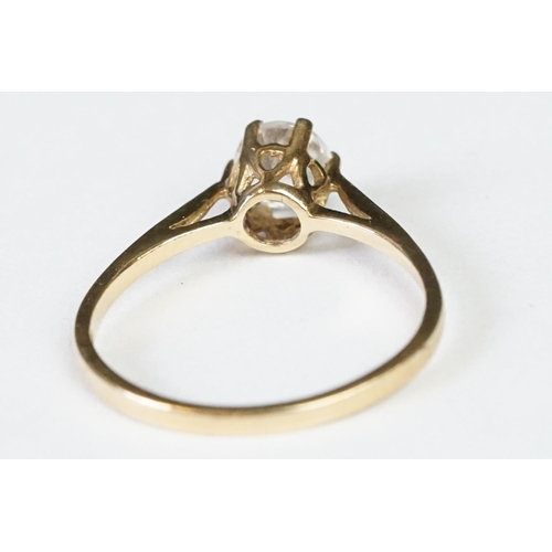 224A - A ladies hallmarked 9ct gold solitaire ring together with a ladies 18ct gold boat ring.