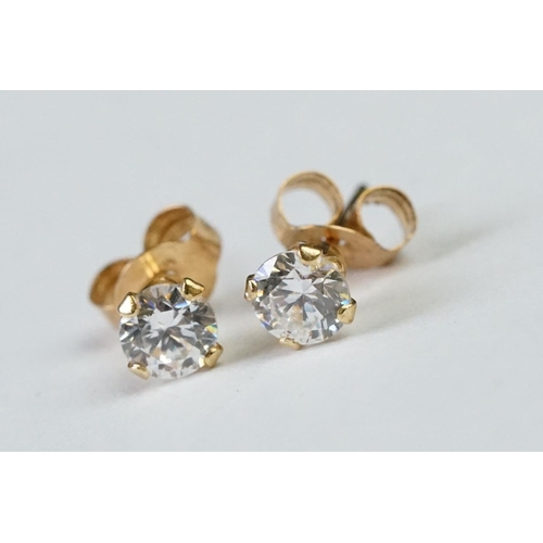 228A - 14ct gold single solitaire earrings