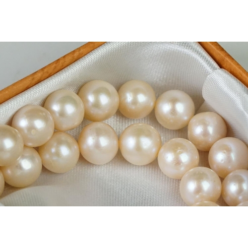 233 - A collection of Borneo sea pearl necklaces, bracelets and earrings.