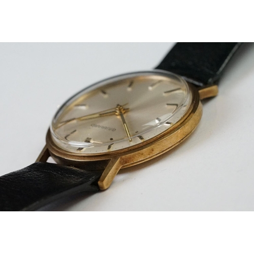 235A - A Gents 9ct gold cased Garrard wristwatch in original display case.