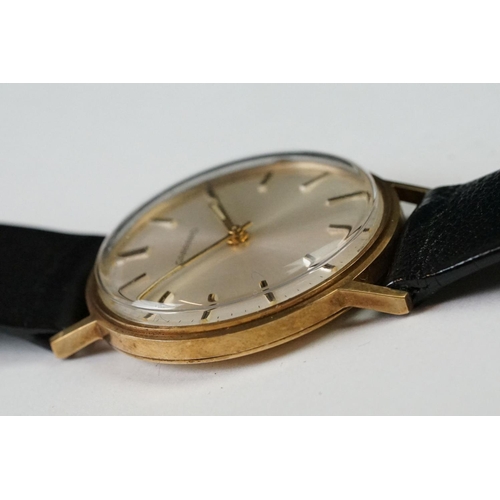 235A - A Gents 9ct gold cased Garrard wristwatch in original display case.