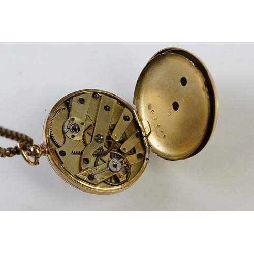 236 - A yellow metal cased fob watch with golden coloured dial and chain.