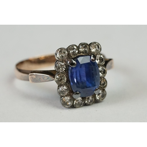 238A - Two vintage ladies dress rings including large central blue paste cluster ring (tested as gold)