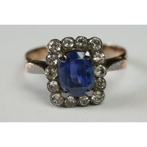 238A - Two vintage ladies dress rings including large central blue paste cluster ring (tested as gold)