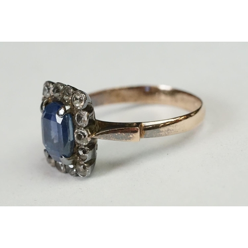 238A - Two vintage ladies dress rings including large central blue paste cluster ring (tested as gold)