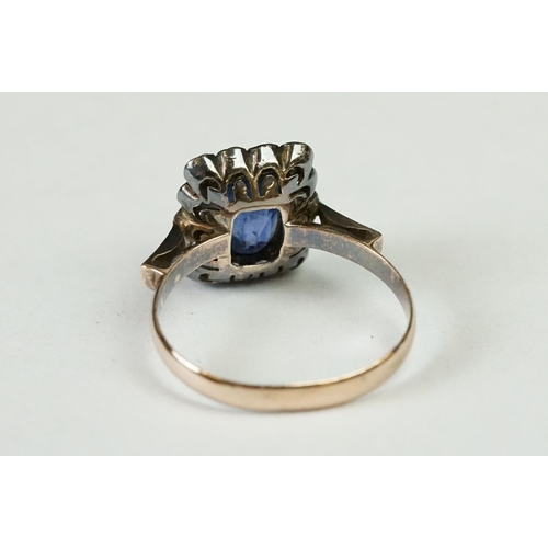 238A - Two vintage ladies dress rings including large central blue paste cluster ring (tested as gold)