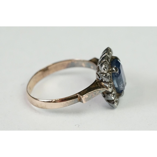 238A - Two vintage ladies dress rings including large central blue paste cluster ring (tested as gold)