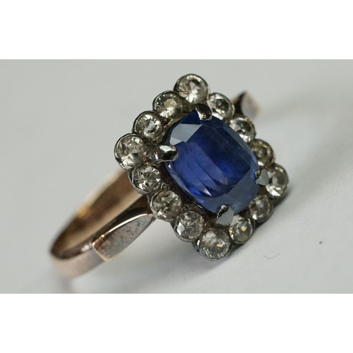 238A - Two vintage ladies dress rings including large central blue paste cluster ring (tested as gold)