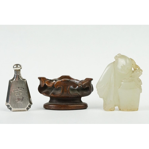 239 - A carved jade figure on wooden base together with a oriental silver scent bottle signed to base.