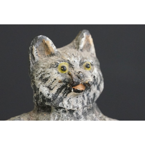 222 - A collection of five early 20th century cold painted spelter novelty cat figures together with a tab... 