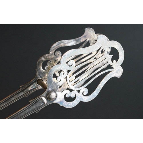 246 - Pair of silver plated meat skewers in the form of swords, a set of plated cake tongs & a soup ladle ... 