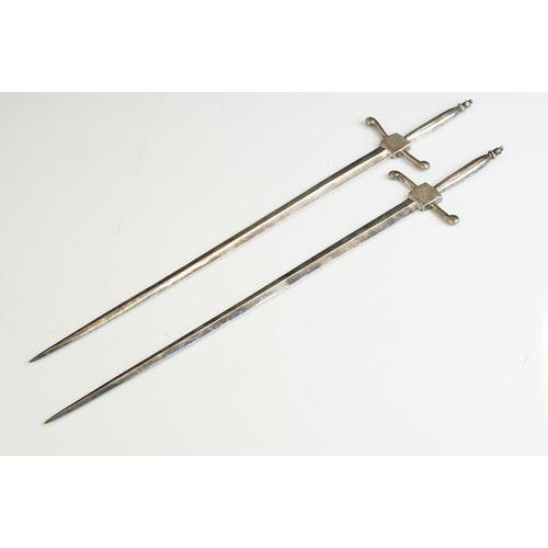 246 - Pair of silver plated meat skewers in the form of swords, a set of plated cake tongs & a soup ladle ... 