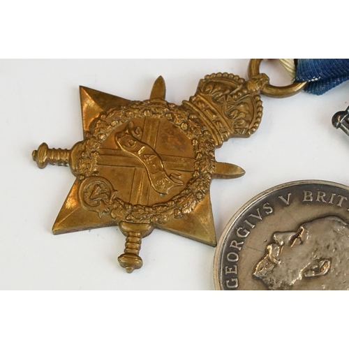 259 - A full size British World War One medal group to include the 1914-15 star medal, the victory medal a... 