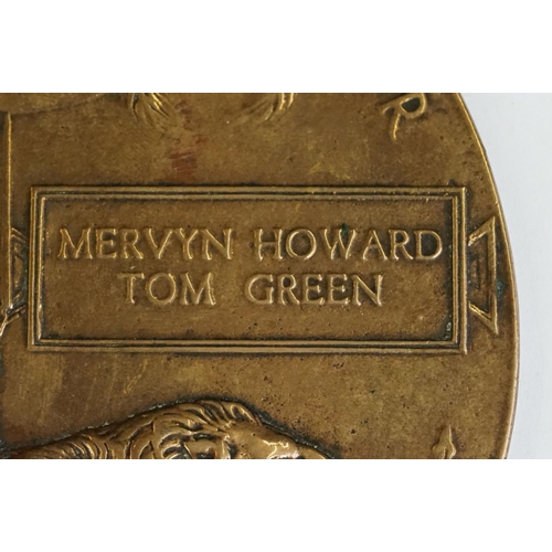 260 - A British World War One death plaque named to MERVYN HOWARD TOM GREEN, complete with card issue slee... 