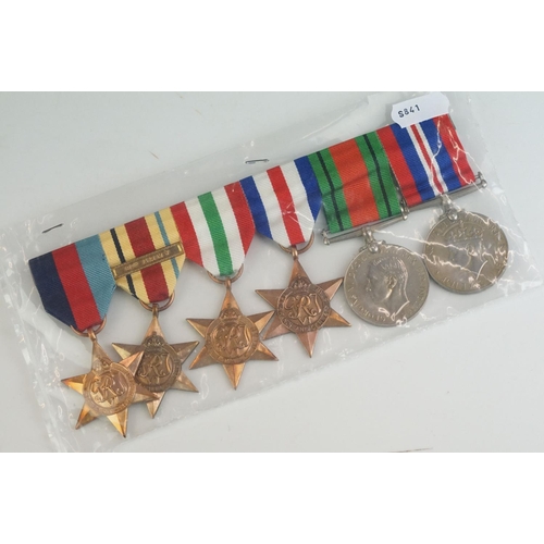 261 - A British full size World War Two medal group of six to include the 1939-45 British war medal, the 1... 