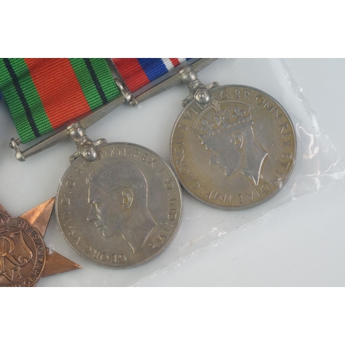 261 - A British full size World War Two medal group of six to include the 1939-45 British war medal, the 1... 