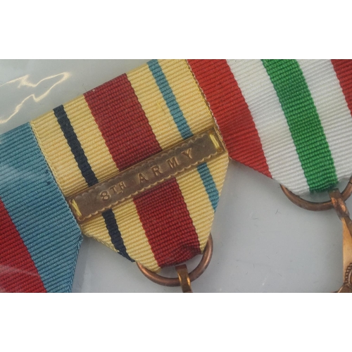 261 - A British full size World War Two medal group of six to include the 1939-45 British war medal, the 1... 