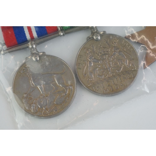 261 - A British full size World War Two medal group of six to include the 1939-45 British war medal, the 1... 