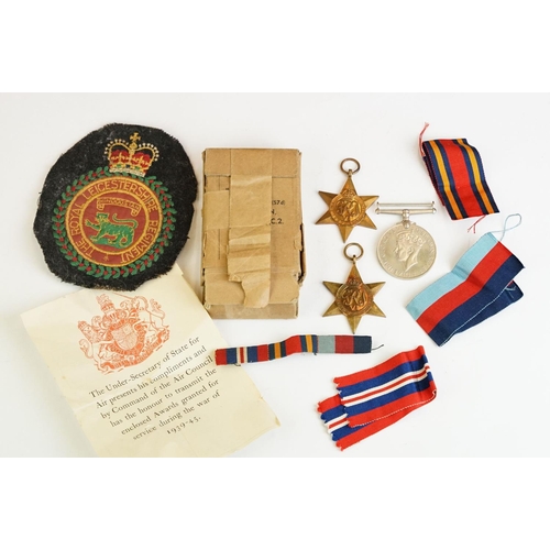 264 - A British World War Two full size medal group of three to include the 1939-45 War Medal, the 1939-45... 