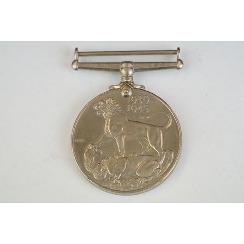 264 - A British World War Two full size medal group of three to include the 1939-45 War Medal, the 1939-45... 