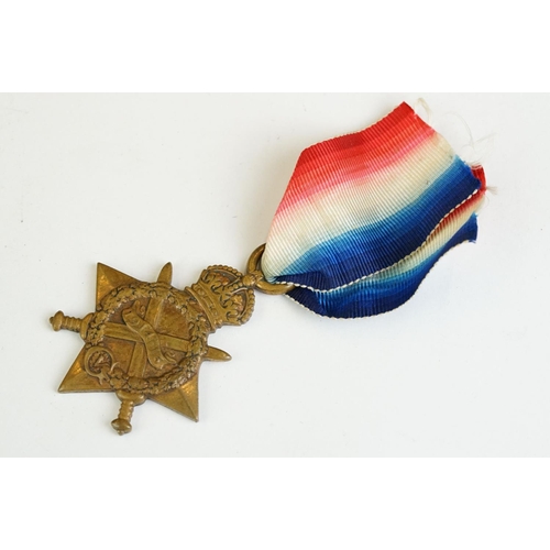 265 - A British World War One full size medal trio to include the 1914-15 star medal, the 1914-18 British ... 