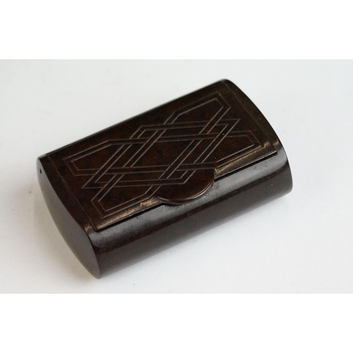 267 - An early 20th century bakelite pocket snuff box together with a antique general improvement medal an... 