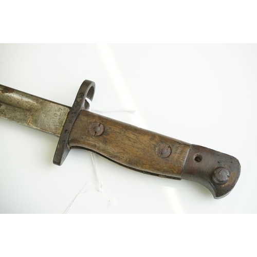 270 - A British World War One 1907 pattern bayonet maker marked for Wilkinson, complete with scabbard.