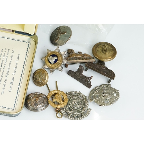 273 - A group of military collectables to include Head Dress Badges of the British Army books in two volum... 