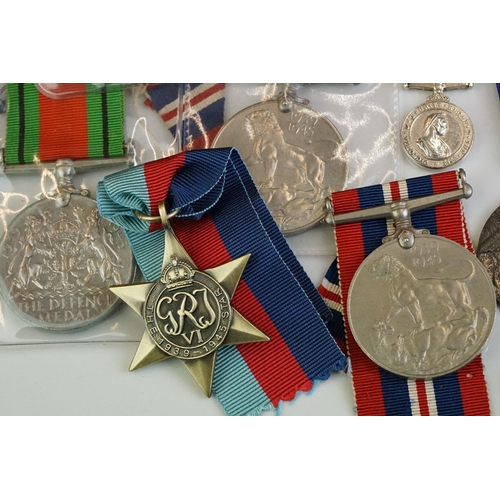 274 - A group of military collectables to include a framed set of Royal Army Ordnance corps badges, a sele... 