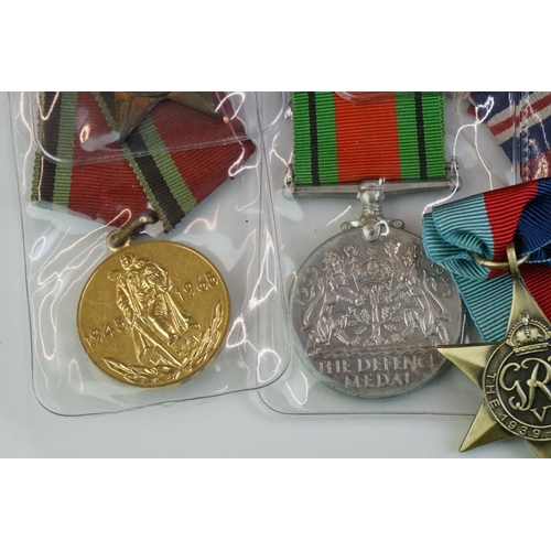 274 - A group of military collectables to include a framed set of Royal Army Ordnance corps badges, a sele... 